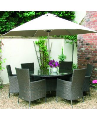small garden parasol with white canopy, covering patio table with chairs